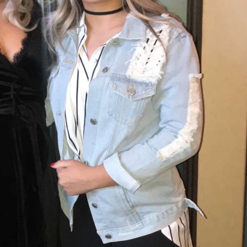 Ripped denim jacket